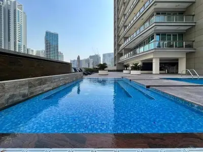 a swimming pool in the middle of a building at HAVN - Studio in 8 Boulevard, Downtown Dubai in Dubai