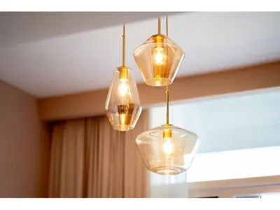a group of lights hanging from a ceiling at KeyRock Living - Stylish 1BR with Pool Access in Dubai