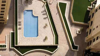 an overhead view of a swimming pool on a building at Daniels 1BR at Sadaf JBR in Dubai