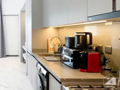 a kitchen with a coffee maker on a counter at Stylish Studio Getaway in Dubai's MAG 920 in Dubai