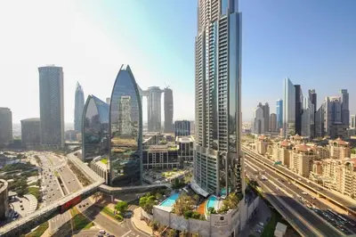 a view of a city with many tall buildings at Partial Burjkhalifa View from Balcony in Dubai Mall-Studio King Bed in Dubai