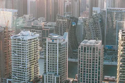 an aerial view of a city with tall buildings at New 1BR APT Business Bay w Burj View in Dubai