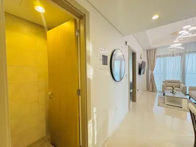 a hallway of a hospital with a mirror and a sink at 2 Bedroom Fully Furnished- Aykon City Tower C in Dubai