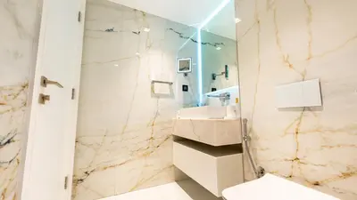 a bathroom with a sink and a shower at Lavish Sidra 3 Villa, 4BR plus M,Private Pool BBQ in Dubai