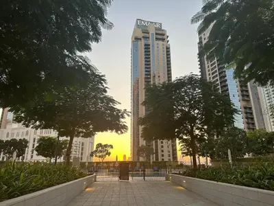 a walkway in a city with tall buildings at Park View Stay at Creek Horizon in Dubai