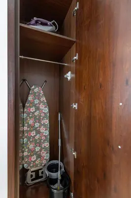 a wooden cabinet with a bag in it at Near Burj Khalifa, Dubai Fountain view, Dubai Mall in 10 mins walk in Dubai