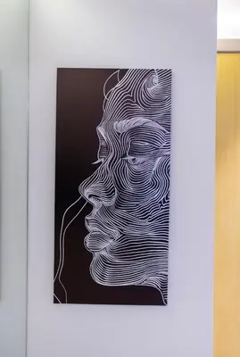 a painting of a woman with aavy at Luxury 2BR above the clouds on38 in Dubai