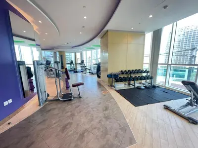 a gym with exercise equipment in a building at Unmatched luxury perfectly located next to Dubai Mall and Burj Khalifa in Dubai