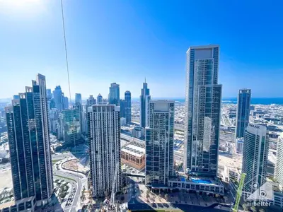 an aerial view of a city with tall buildings at Grande Luxury 1B With Balcony & City Views in Dubai
