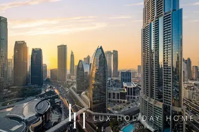 a view of a city skyline with skyscrapers at LUX The EMAAR Fashion Avenue Studio 2 in Dubai