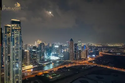 a view of a city at night with traffic at Luxury Sea View High Floor 3Bhk in Dubai