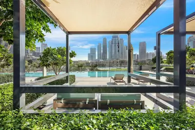 a view of a pool from a building at FIRST CLASS 2BR Burj Khalifa & Fountain view in Dubai