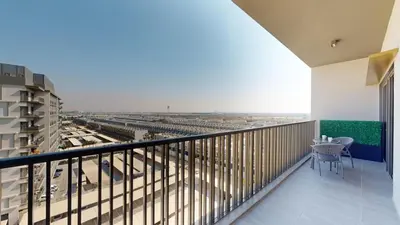 a balcony with a view of a city at Mag Eye 890 - Airy One Bedroom in Meydan in Dubai