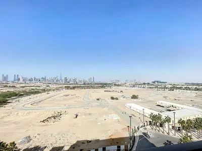 a view of a beach with a city in the background at Mag Eye 900 - One Bedroom with Downtown Dubai View in Dubai