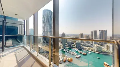 an apartment balcony with a view of a harbor at Vacationer I Luxury 2BR I Marina Views I Close to JBR Beach I Sparkle Tower in Dubai