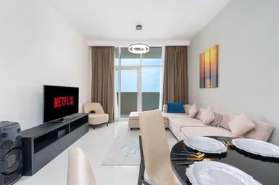 a living room with a couch and a table at Ahlan HH - Luxury 2BR Damac Tower 108 at High Floor in Dubai
