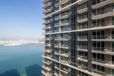 a tall building with a view of the water at Frank Porter - Beach Vista Tower 2 in Dubai