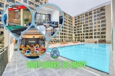 a collage of photos of a hotel with a pool at Pure Voyage Town Square in Dubai