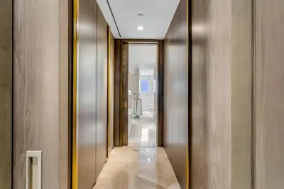 a hallway of a bathroom with a walk in shower at luxury penthouses see view at five in Dubai