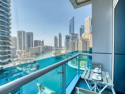 a balcony with a view of the city at Classic Orra Marina-1BR in Dubai