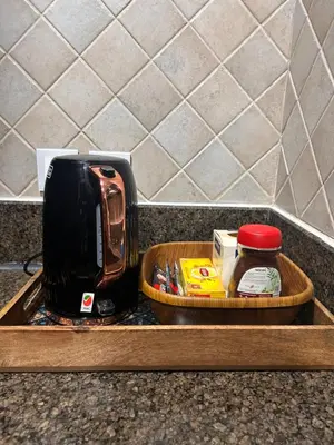 a toaster sitting on top of a kitchen counter at Dubai mall Aparment in Dubai