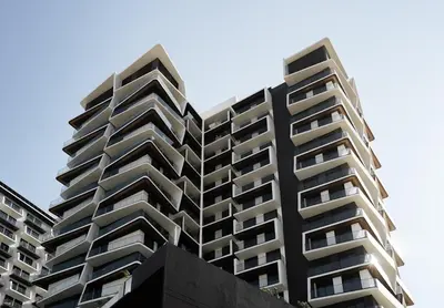 a tall building with balconies on the side of it at Stylish 3 Bedroom in JVC in Dubai