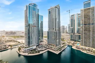 an aerial view of a city with tall buildings at GuestReady - Stylish haven with lake views in Dubai