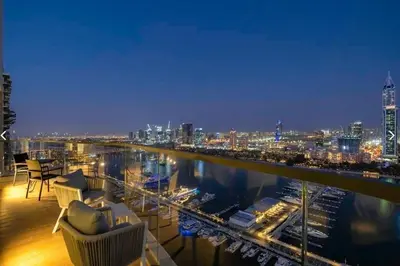 a view of a city at night from a balcony at شقة مع منظر رائع in Dubai