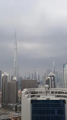 a view of a city skyline with a tall building at Studio in downtown with Burj Khalifa and city view in Dubai