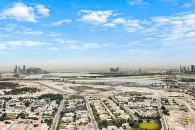 an aerial view of a city and a river at Elegant 1BR in Heart of Dubai, Walk to Top Malls in Dubai