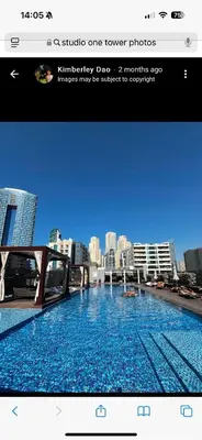 a picture of a large swimming pool in a city at Beautiful 1 bed apartment Marina I Sleeps 4 in Dubai
