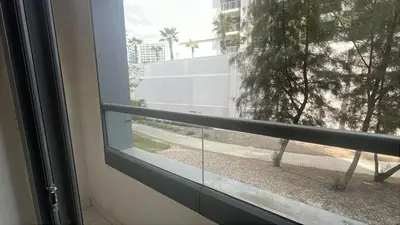 a window with a view of a street at Capital bay in Dubai