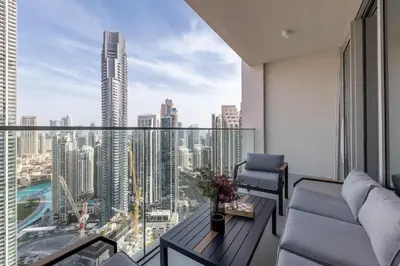 a balcony with a view of a city at Royal 4BR Burj Khalifa View Dubai Mall in Dubai