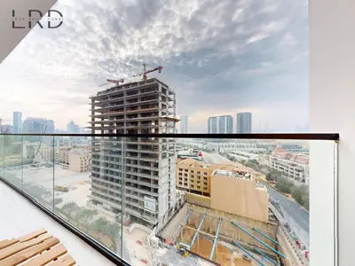 a view from the balcony of a building under construction at Brand New and Modern Smart Home 1BR in Dubai