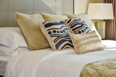 a white bed with pillows on top of it at Luxury Living At The Address Dubai Marina! in Dubai