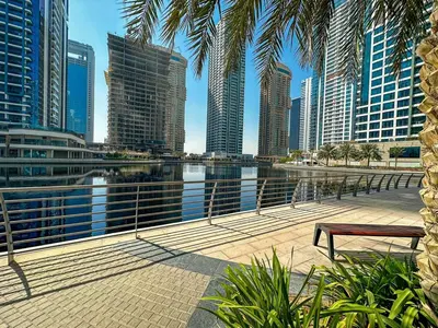 a view of a city with a river and buildings at Higuest - Lake-view Studio in JLT in Dubai