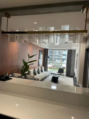 a living room with a couch and a table at D Stays holiday homes 1min walk to Dubai mall & Burj Khalifa in Dubai