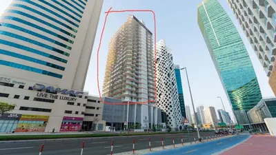 a group of tall buildings in a city at Luxury Oasis - Burj Khalifa Views in Dubai