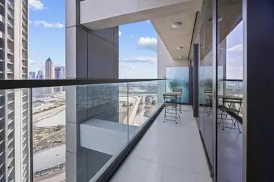 a balcony in a building with a view of the city at Dubai Aykon city in Dubai