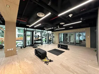 a large room with a gym with pilates equipment at Trophy-Lux 1BR Jacuzzi Suite Busbay W Big Balcony in Dubai