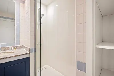 a bathroom with a shower and a sink at Silkhaus Large Studio in Madison near Barsha Heights in Dubai