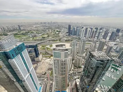 an aerial view of a city with tall buildings at Torch Tower - One Bed with Skyline View in Marina in Dubai