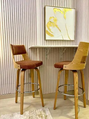 two chairs sitting next to each other in a room at Meydan Riviera Midtown Comfort Studio in Dubai