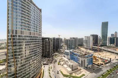 an aerial view of a city with tall buildings at Silkhaus Homey 2BR at Mayfair Tower in Business Bay in Dubai