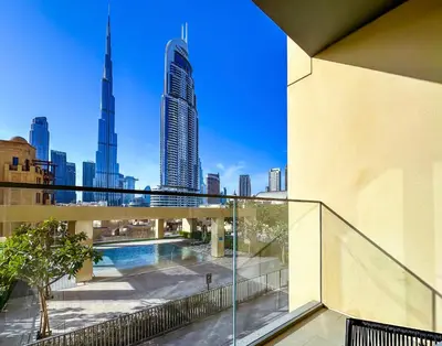 a balcony with a view of a city skyline at Spectacular Burj Khalifa View, 2BR Luxury Apartment by SBH in Dubai