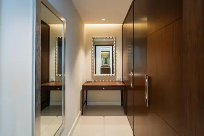 a bathroom with a sink and a mirror at Address Dubai Mall Residences in Dubai