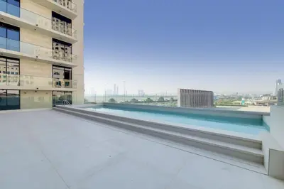 a view from the roof of a building with a swimming pool at O Ten Al Jaddaf - Stylish Studio in Dubai