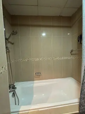 a bathroom with a bath tub in a room at Click Stay - JLT - 2 Bedroom & Balcony Lakes View Entire Apartment -SS in Dubai