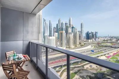 a balcony with a view of a city at Frank Porter - Green Lakes in Dubai