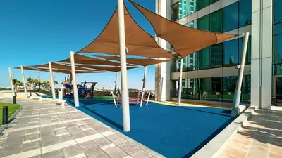 a large wooden canopy on the side of a building at Glorious Burj Khalifa and Fountain views in Dubai
